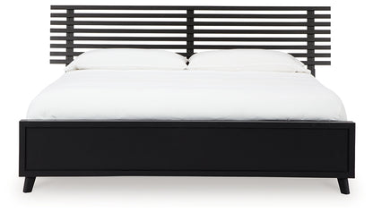 Danziar King Panel Bed with Mirrored Dresser