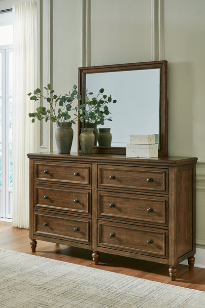 Sturlayne King Upholstered Panel Bed with Mirrored Dresser and Nightstand