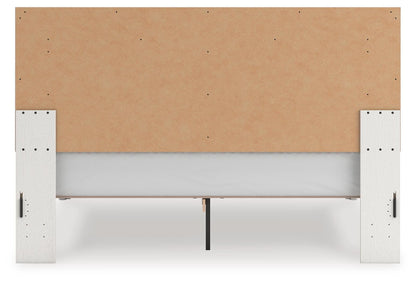 Zuraleus King Upholstered Panel Platform Bed