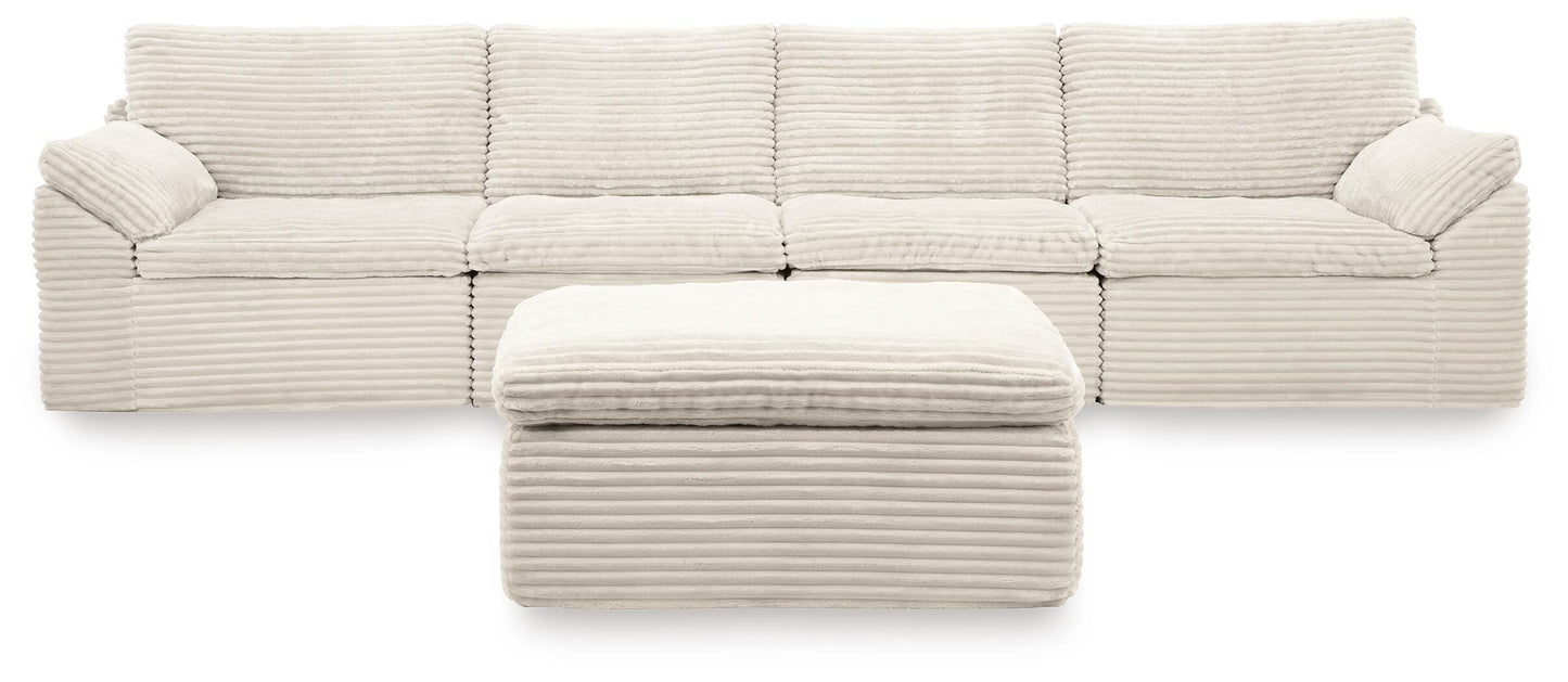 Ashley Express - Fannin 4-Piece Sectional with Ottoman