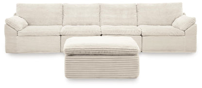 Ashley Express - Fannin 4-Piece Sectional with Ottoman