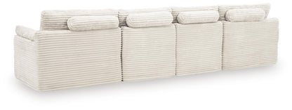 Ashley Express - Fannin 4-Piece Sectional with Ottoman