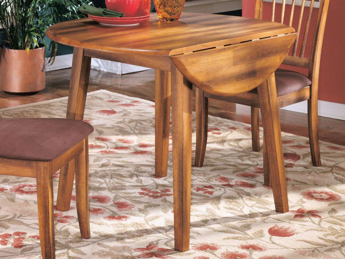 Ashley Express - Berringer Round DRM Drop Leaf Table