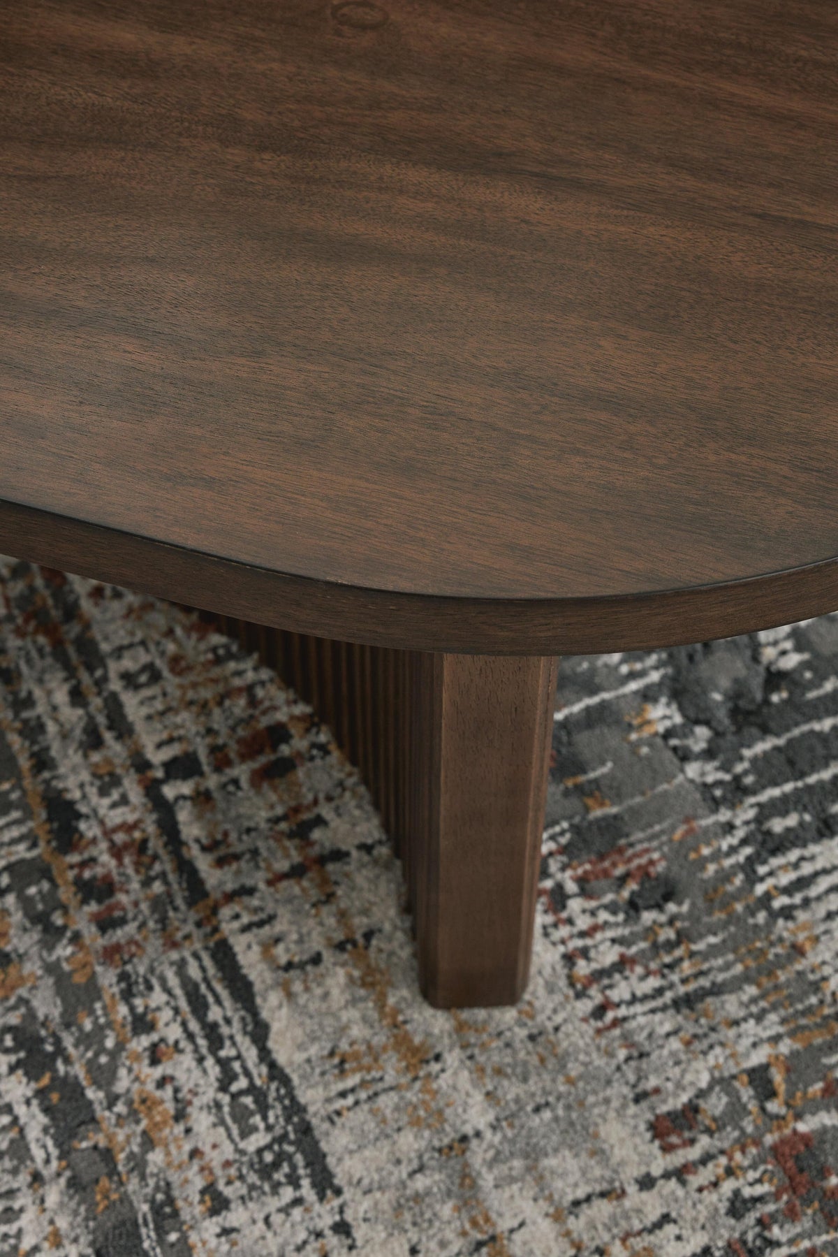 Ashley Express - Korestone Oval Cocktail Table